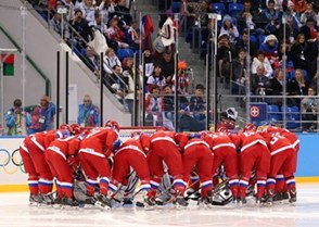SOCHI, RUSSIA - FEBRUARY 11: Team Russia gathers around the net prior to their game against team Japan during women's preliminary round action at the Sochi 2014 Olympic Winter Games. (Photo by Andre Ringuette/HHOF-IIHF Images)

