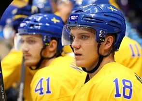 SOCHI, RUSSIA - FEBRUARY 14: Sweden's Jakob Silfverberg #18 looks on from the bench during the game against team Switzerland during men's preliminary round action at the Sochi 2014 Olympic Winter Games. (Photo by Andre Ringuette/HHOF-IIHF Images)