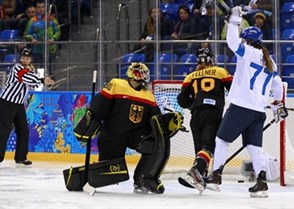 SOCHI, RUSSIA - FEBRUARY 16: Germany's Jennifer Harss #30 and Susanne Fellner #18 look on as Finland's Susanna Tapani #77 celebrates after a first period goal during women's classification round action at the Sochi 2014 Olympic Winter Games. (Photo by Jeff Vinnick/HHOF-IIHF Images)

