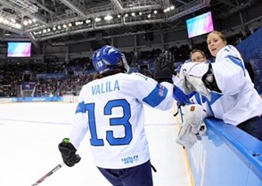SOCHI, RUSSIA - FEBRUARY 18: Finland's Riikka-Hanna Valila #13 celebrates her first period goal at the bench against Russia during women's classification round action at the Sochi 2014 Olympic Winter Games. (Photo by Andre Ringuette/HHOF-IIHF Images)

